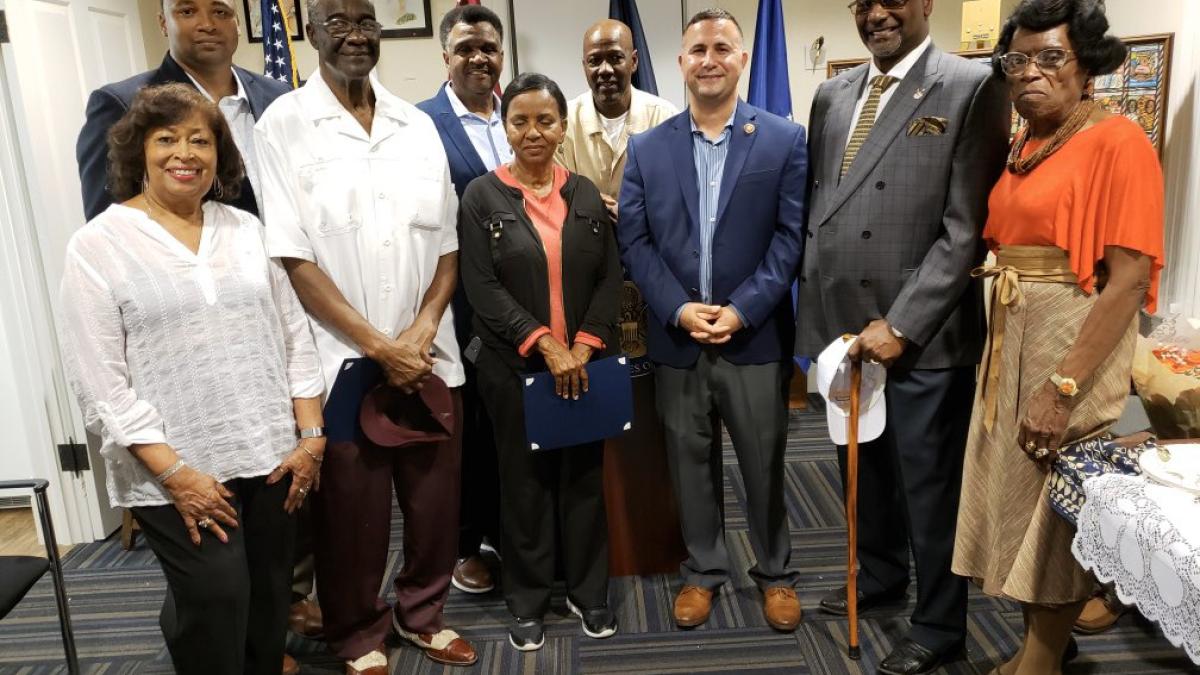 Rep. Soto posing with a group of community leaders