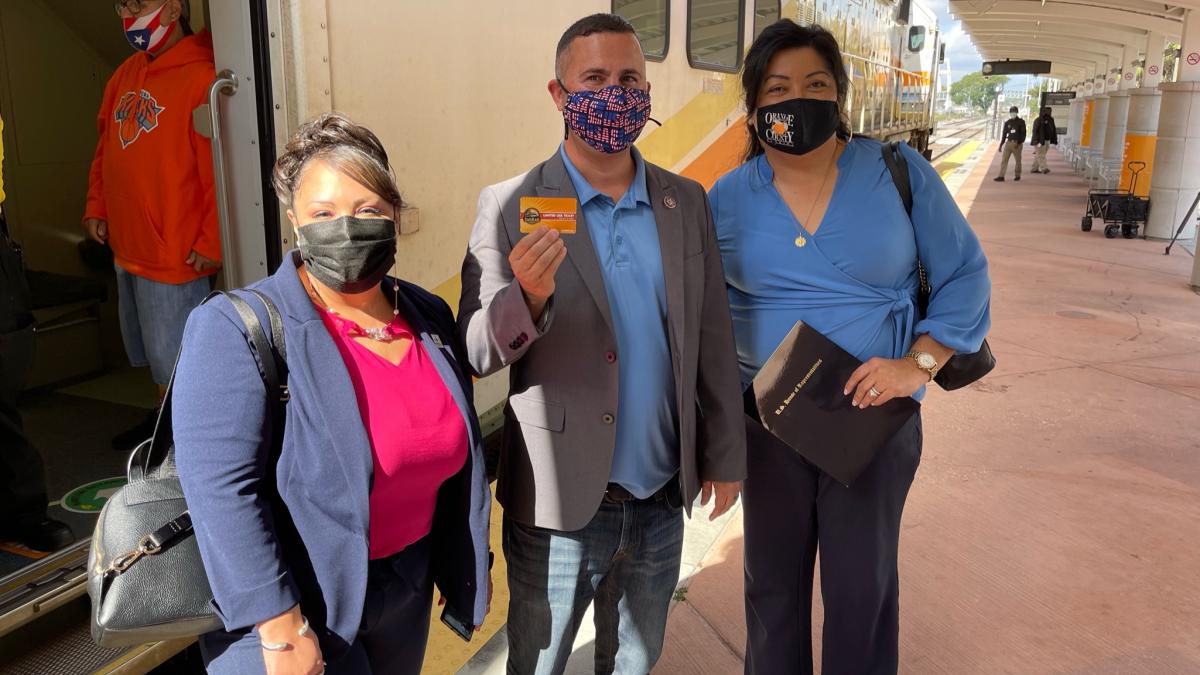 Viviana Janer, Darren Soto, and Mayra Uribe at the Downtown Orlando SunRail station